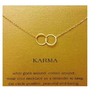 Karma Necklace  in Gold Tone